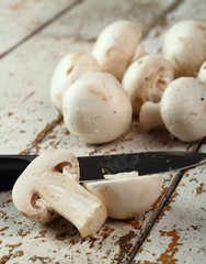 fresh mushrooms on a chopping board
