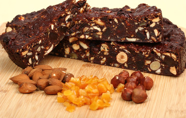 Chocolate Cake. Fruitcake Panforte is a traditional Italian dessert containing fruits and nuts.