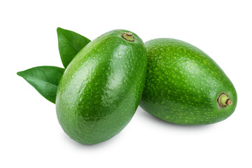 whole avocado with leaves isolated on white background close-up