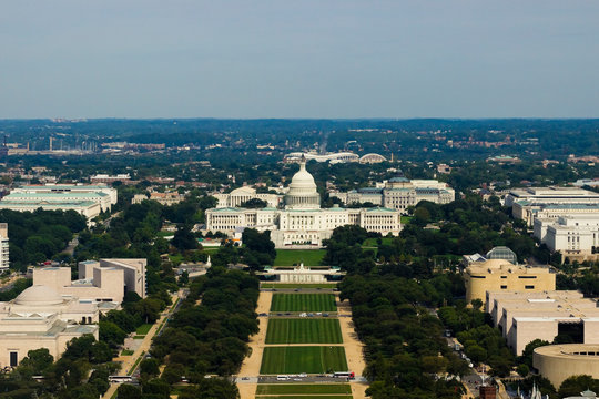 Aerial view overlooking the ceremonial tree-lined boulevard of the Mall looking eastwards towards the United States Capitol Building, Washington DC