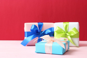 gifts on a colored background. Holiday, giving presents, birthday.