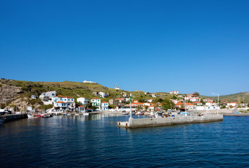 Fototapeta na wymiar View to the picturesque harbor of Ai Stratis island, Greece