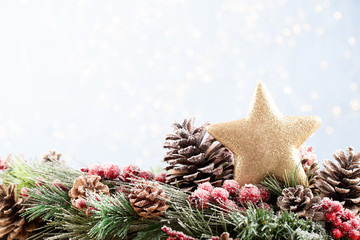 Christmas fir tree with bokeh background. Merry Christmas and Happy New Year. Christmas bokeh background with snow fir tree. Top view with copy space for your text.
