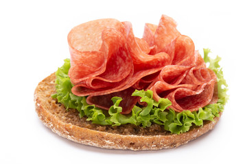Sandwich with ham sausage on white background.