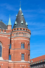 Fototapeta na wymiar Historic building of City Hall, red brick tower, Helsingborg; Sweden
