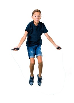 Little Kid Jumping Rope On Isolated White Background