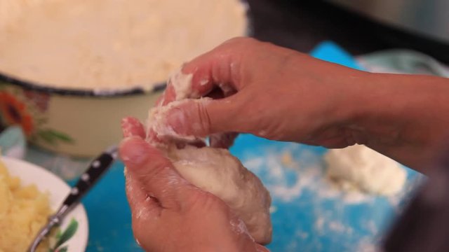 Creating a pie shape. Cooking from the dough. Dough. Cooking pies. Pie. Cooking. Cooking. Cooking Cook. Kitchen. Food. Close-up.