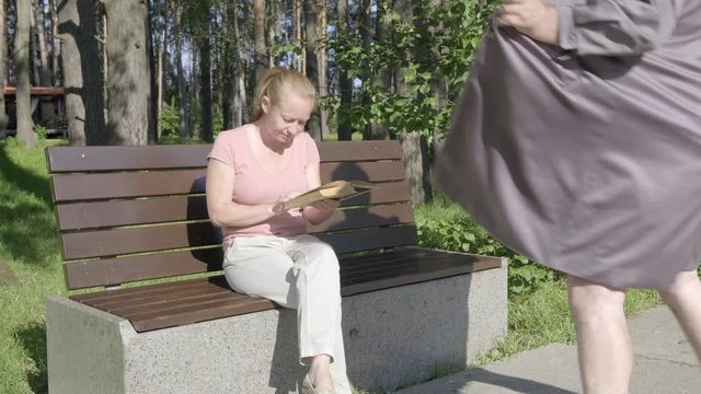 Male pervert in park. man exhibitionist opens coat in front of girl. woman gets scared and runs away.
