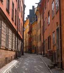 Fototapeta na wymiar Sweden, Stockholm, on an old street in Gamlastan. The ancient part of the city
