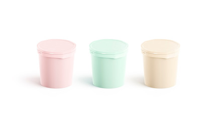 Blank colored ice cream buckets mockup set, side view, 3d rendering. Empty plastic pails mock up, isolated. Clear fruit ice-pop box. Strawberry and pistachio tasty sundae template.