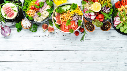 Set of dishes on the table. Rice, lentils, chickpeas, meat and fish. Dishes menu. Free copy space....