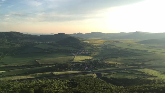 View from Lovos Hill. Sunset  in Central Bohemian Highlands, Czech Republic. Central Bohemian Uplands  is a mountain range located in northern Bohemia. The range is about 80 km long.