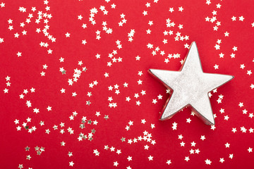 Christmas composition. Christmas golden glittering decorations on color background. Flat lay, top view, copy space - Image