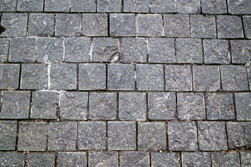 Street tile of gray color from small pebbles.