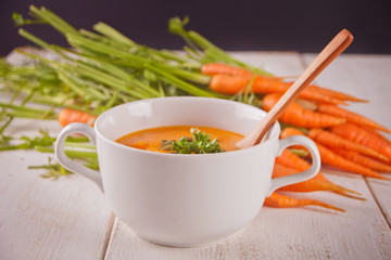 Healthy eating carrot cream soup. Vegetarian vegetables soup.