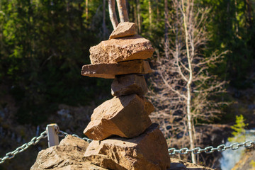 Stones in equilibrium. pile of rocks in the woods. stack of stones in the forest
