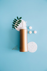 Mockup Spa bottles on blue background. Concept natural organic cosmetics. Copy space.