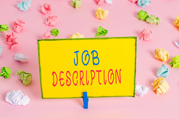Word writing text Job Description. Business photo showcasing a formal account of an employee s is responsibilities Colored crumpled papers empty reminder pink floor background clothespin