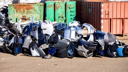 Bumper auto. Recycling plastic . Colored plastic trash cans . Large wheelie bins . Urban recycling waste and garbage services