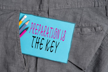 Conceptual hand writing showing Preparation Is The Key. Concept meaning it reduces errors and shortens the activities Writing equipment and blue note paper in pocket of trousers