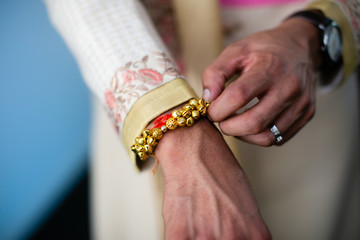 Indian groom's getting ready close up