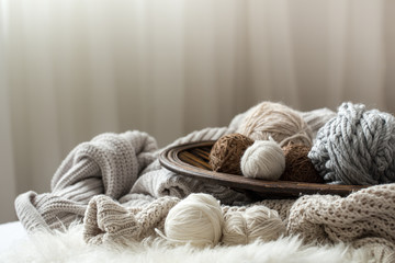 Fototapeta na wymiar Still life with a cozy variety of yarn for knitting.