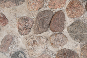 Cobblestone pavement, background with grunge texture