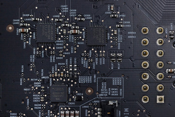 Close up of an electric circuit board. Microelectronics engineering technology
