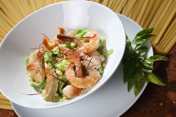 Spinach pasta with fresh shrimp and guajillo chili.