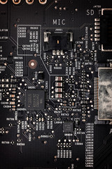Close up of an electric circuit board. Microelectronics engineering technology