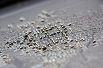 Close up of an electric circuit board. Microelectronics engineering technology
