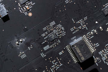 Close up of an electric circuit board. Microelectronics engineering technology