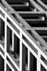 Close-up view of modern building facade with strong black and white patterns