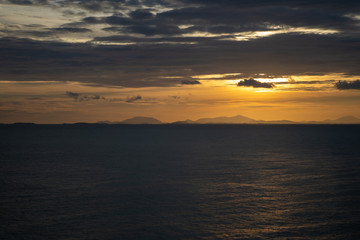 Sunset sea and mountain