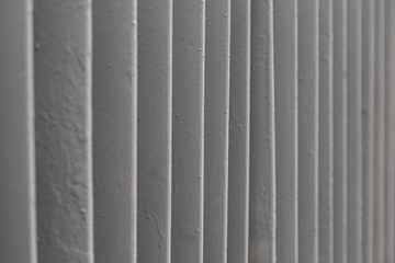Metal bars of balustrade, background with grunge texture