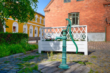 Turquoise fire hydrant on a street