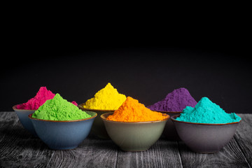 Colorful powder paints in bowls for Indian Holi festival