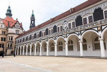 Fototapeta na wymiar Columns in the courtyard of the Procesion Del Principe building in Dresden, Germany