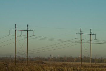 Power line posts. high voltage tower on the sky background