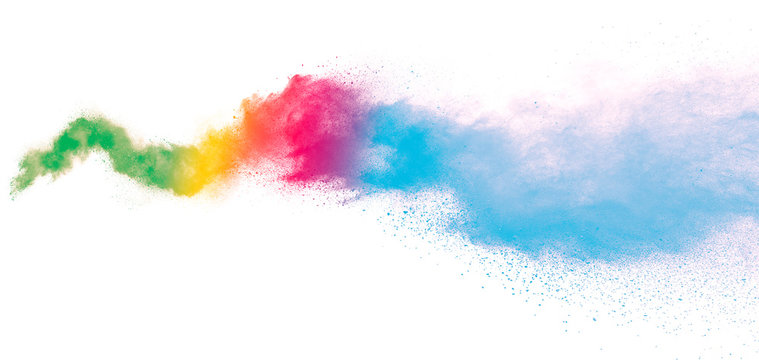 Freeze motion of colorful color powder exploding on white background.  Paint Holi.