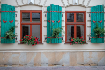 Postcard of a building with beautiful windows in Europe