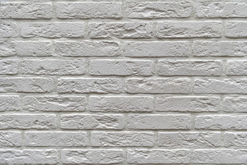 Wall made of white decorative brick. Background for the wall in LOFT style