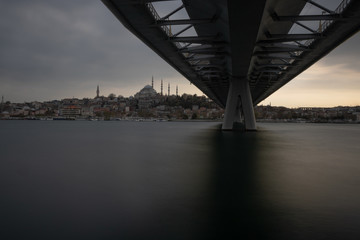 Halic (golden horn) metro bridge and suleymaniye mosque in Istanbul