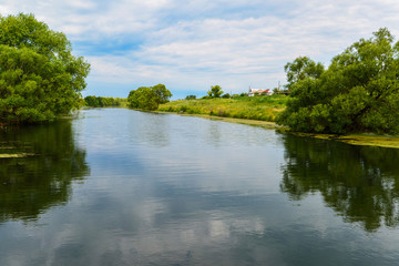 Fototapeta na wymiar Summer landscape with a river in the countryside