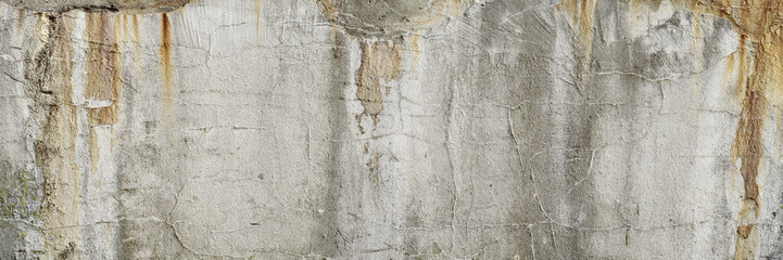 Textur einer alten, verwitterten, grauen Wand aus Beton als Hintergrund