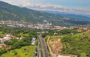 Fototapeta na wymiar Highway 27 over the mountains in Alto de Las Palomas, Escazu, Costa Rica