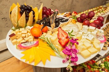 Fruit vegetarian canape at skewers catering snack with cheese