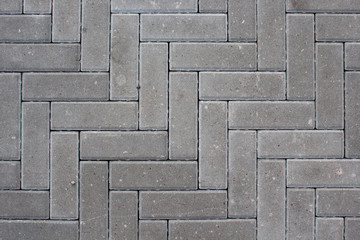 Paving slabs, top view. Gray urban texture as background. Pavement texture.