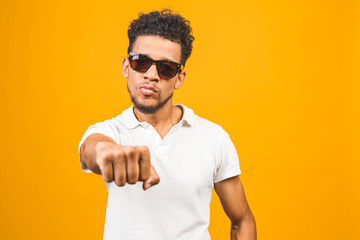 Cool afro american man wearing sunglasses over isolated background, having successful idea. Exited and happy. Number one.