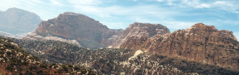 Panorama of the canyon. Stone desert under a blue sky with clouds. 3d rendering.